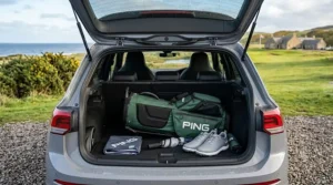 A golf stand bag shown collapsed, highlighting its compact design for easy storage in a car boot or locker.