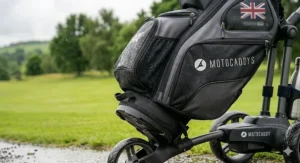 Ergonomic grab handles and carrying strap system for lifting the golf cart bag on and off the trolley.
