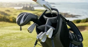 Four-way divider top cuff on a lightweight golf stand bag keeping clubs organised.