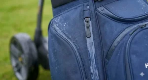 Close-up of durable, water-resistant material on golf cart bag to protect clubs in rain.