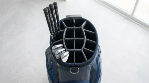Overhead view of a Benross golf bag's 14-way divider top with individual club slots and a dedicated putter well.