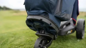 Detailed view of the insulated cooler pocket on a cart-friendly golf bag for storing drinks.