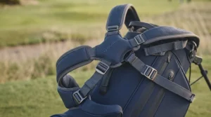 Ergonomic dual-strap system on a golf bag for effortless carrying and balanced weight distribution.