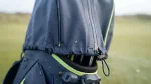 The included matching waterproof rain hood attached to the bag.