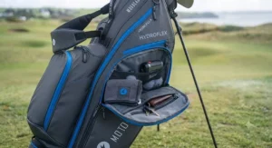 Multiple spacious storage pockets and apparel compartments open on the Motocaddy HydroFlex waterproof bag.