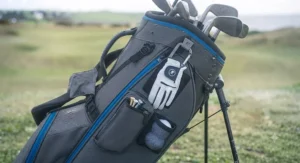 Integrated towel hook and accessory holder positioned on the side of the Motocaddy HydroFlex golf bag.
