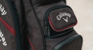 Multiple zipped storage pockets on the side of the Callaway Org 14 cart bag for golf gear.