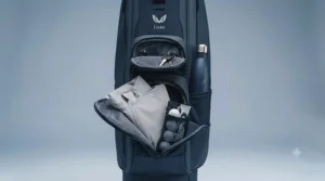Side view showing multiple zipped pockets for organised storage on a compact carry bag.