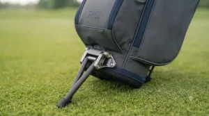 Durable, wide-set legs on a lightweight stand bag for stable placement on uneven turf.