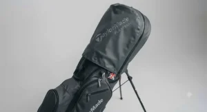 TaylorMade FlexTech stand bag fitted with its protective rain hood.