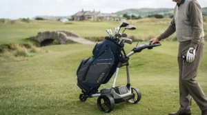Senior golf bag securely fitted onto an electric golf trolley at a UK golf club.