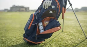 Multi-way top divider on a junior golf bag to keep clubs organised and protected.
