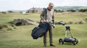 Golfer easily lifting a lightweight cart bag designed specifically for senior mobility.