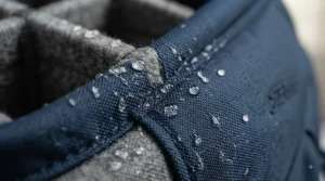 Close-up of durable, weather-resistant fabric on a golf bag organiser built for rainy rounds on the course.