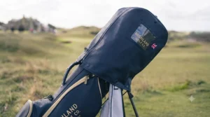 Water-resistant lightweight ladies golf bag fitted with a rain hood for protection against sudden British showers.