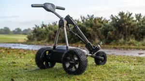 Spiked winter hedgehog wheels fitted onto an electric golf trolley to protect soggy golf course turf.