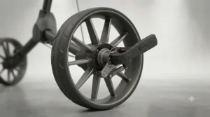 Close-up of durable ball-bearing wheels and the foot-operated parking brake on a 3-wheel golf push trolley designed for damp UK turf.