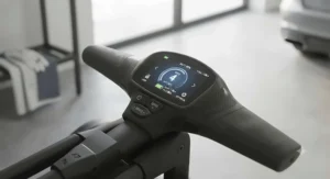 Waterproof digital handle display on a lithium battery golf trolley showing speed settings and battery life.