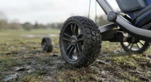 High-traction winter wheels fitted to an electric trolley to protect turf on muddy British golf courses.