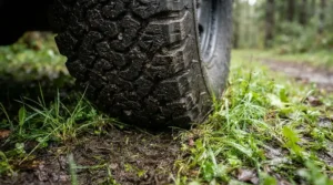 Detail shot of the specialised wheels on a push trolley for hilly courses providing extra grip